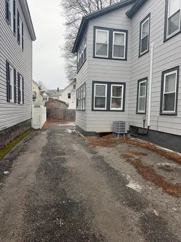 a front view of a house with yard