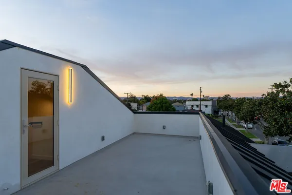 a view of a terrace with a yard