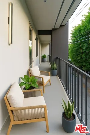 a porch with furniture and garden