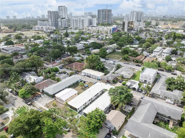 an aerial view of a city with lots of residential buildings