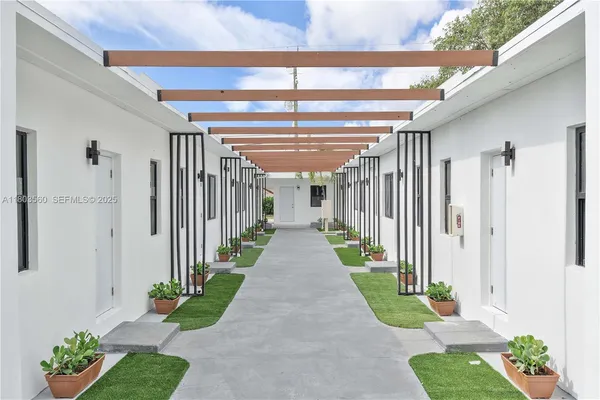 a view of a pathway with a house