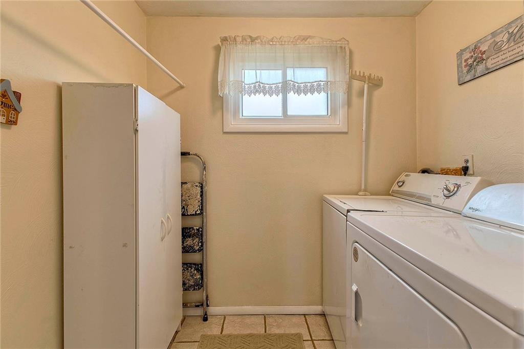 8002 Hayward Street Irwin, PA 15642 - Photo 15 of 31 a utility room with dryer and washer