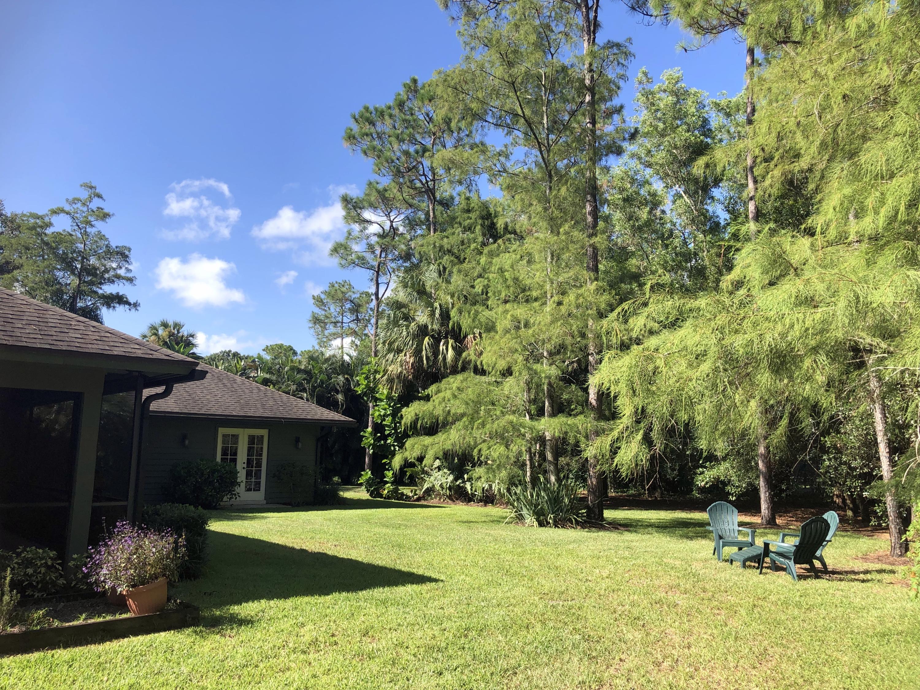 10409 Trailwood Circle Jupiter, FL 33478 - Photo 25 of 43 BackYard
