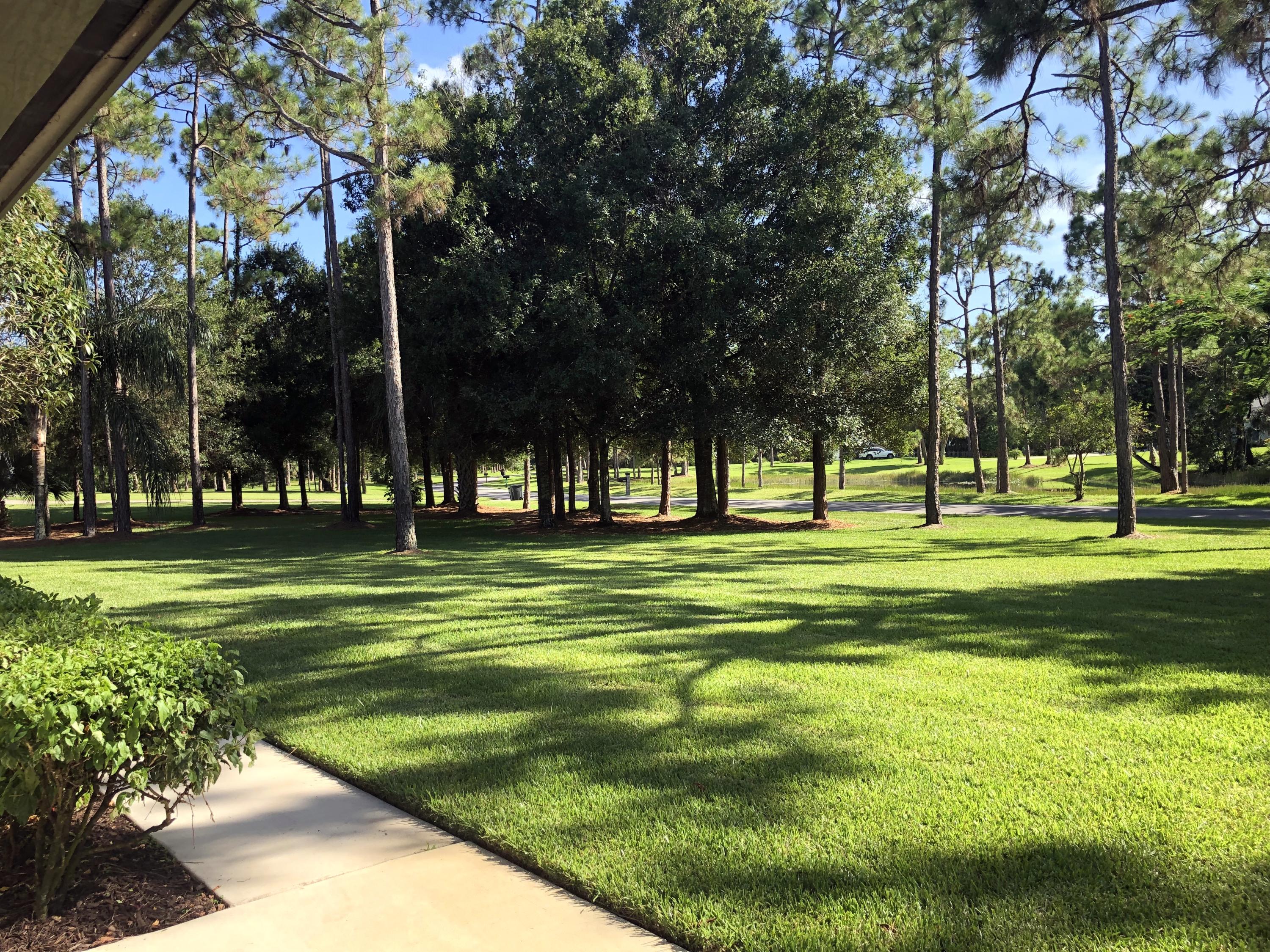 10409 Trailwood Circle Jupiter, FL 33478 - Photo 31 of 43 FrontYard3