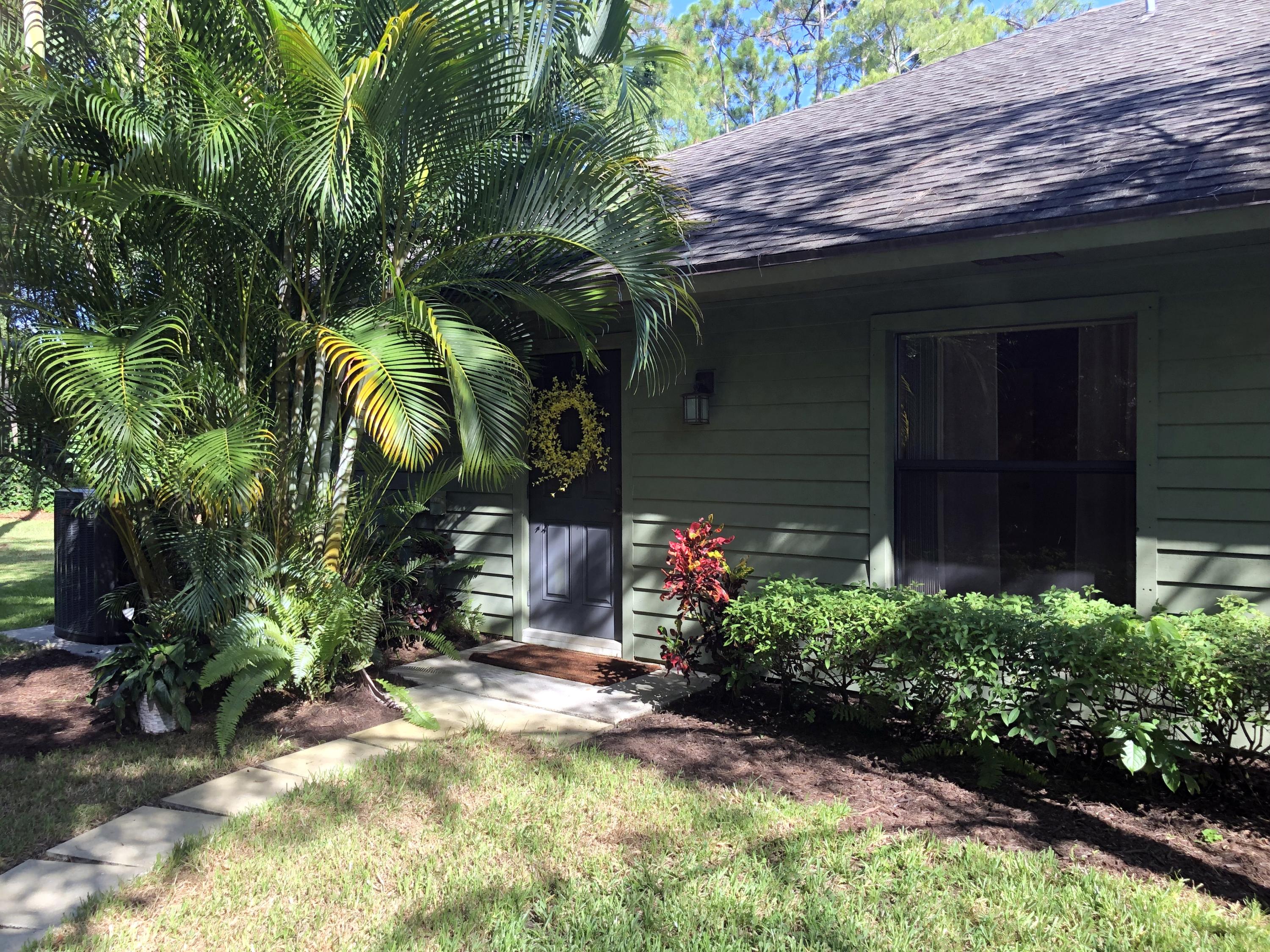 10409 Trailwood Circle Jupiter, FL 33478 - Photo 5 of 43 SeparateInLawEntrance