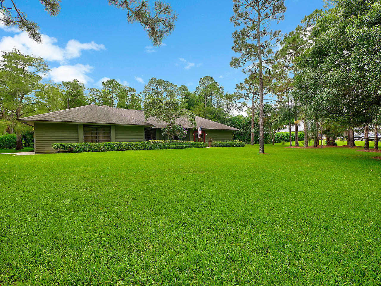 10409 Trailwood Circle Jupiter, FL 33478 - Photo 7 of 43 Front