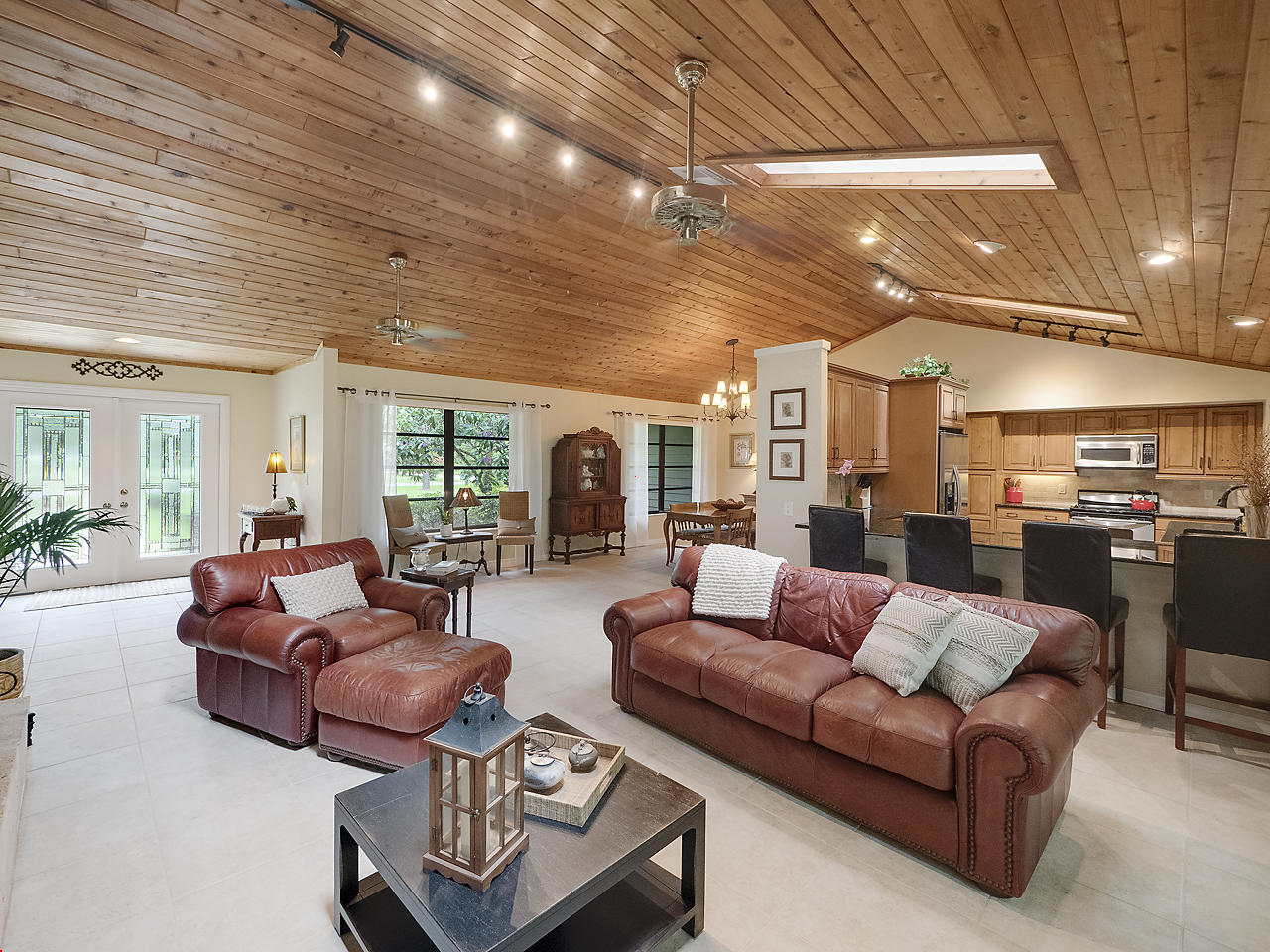 10409 Trailwood Circle Jupiter, FL 33478 - Photo 8 of 43 Living-Dining-Kitchen