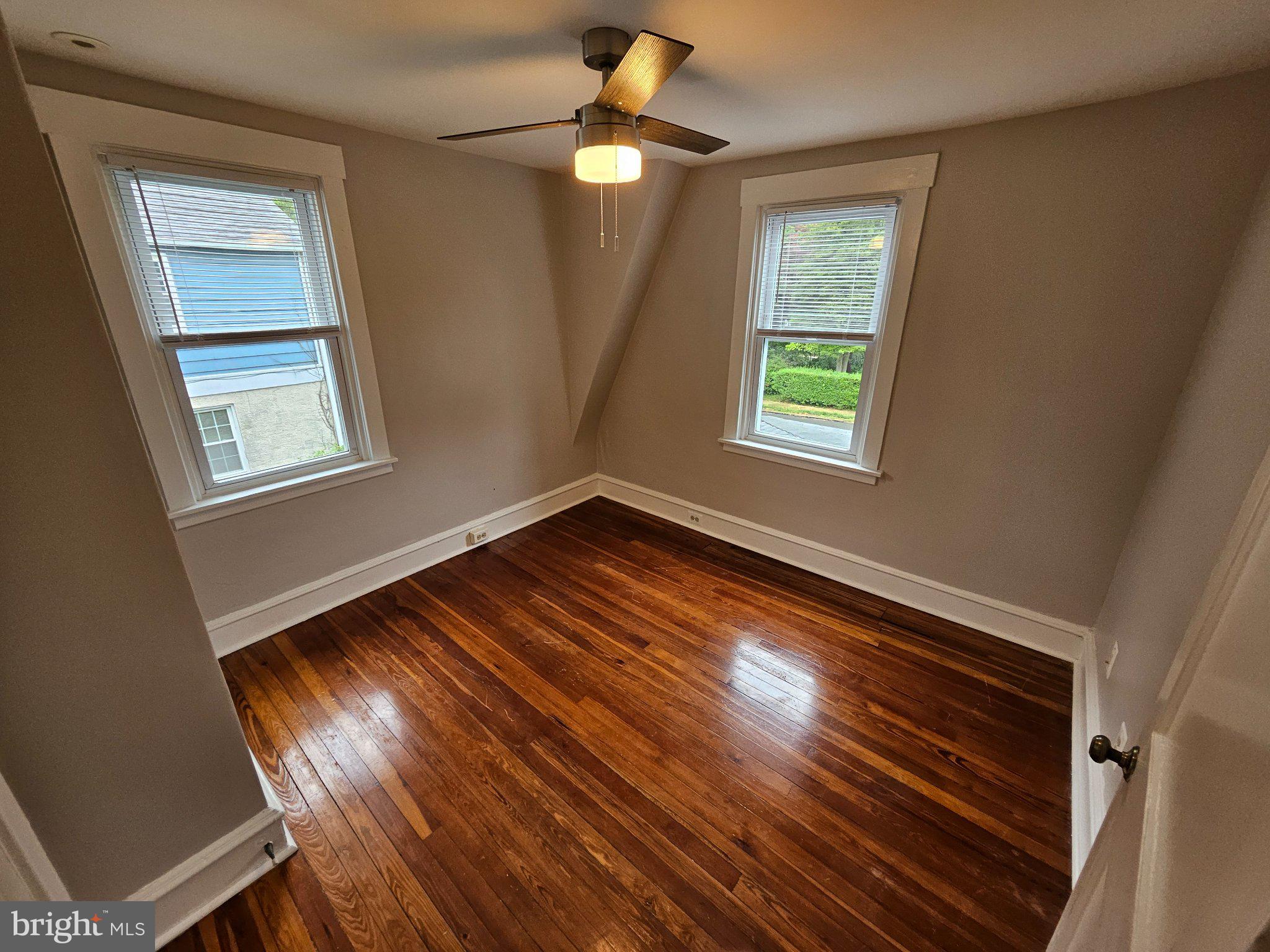 6 Arthur Road, Unit FRONT Rosemont, PA 19010 - Photo 18 of 24 Bright, airy room with polished floors.