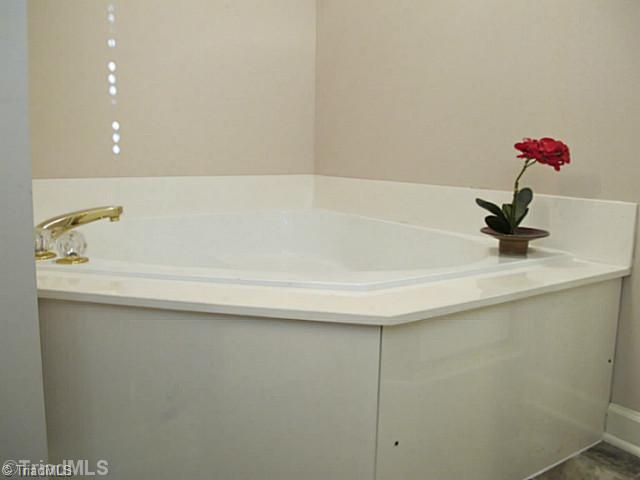 2695 Union Grove Road Lexington, NC 27295 - Photo 12 of 16 Master Bath/Spa. Take the stress away in the Jetted tub at the end of the day.