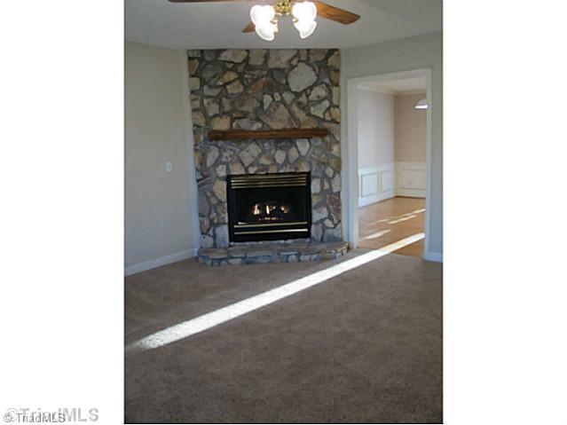 2695 Union Grove Road Lexington, NC 27295 - Photo 9 of 16 Living Room. Very nice fireplace with mantel in the Living room.