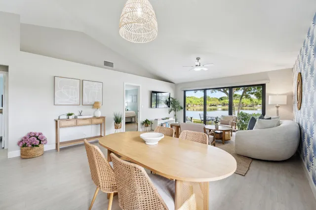a view of living room with granite countertop furniture and a large window
