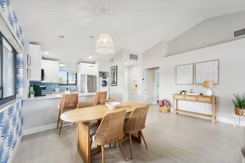 a kitchen with a sink stove and microwave
