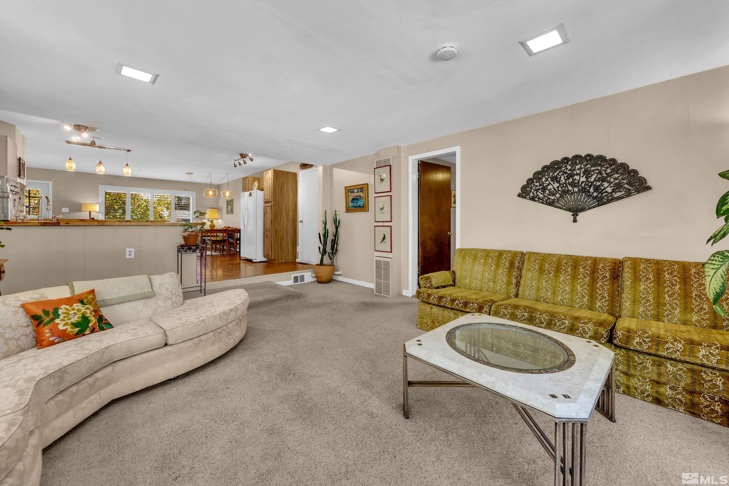 1340 Wesley Drive Reno, NV 89503 - Photo 16 of 39 a living room with furniture and a rug