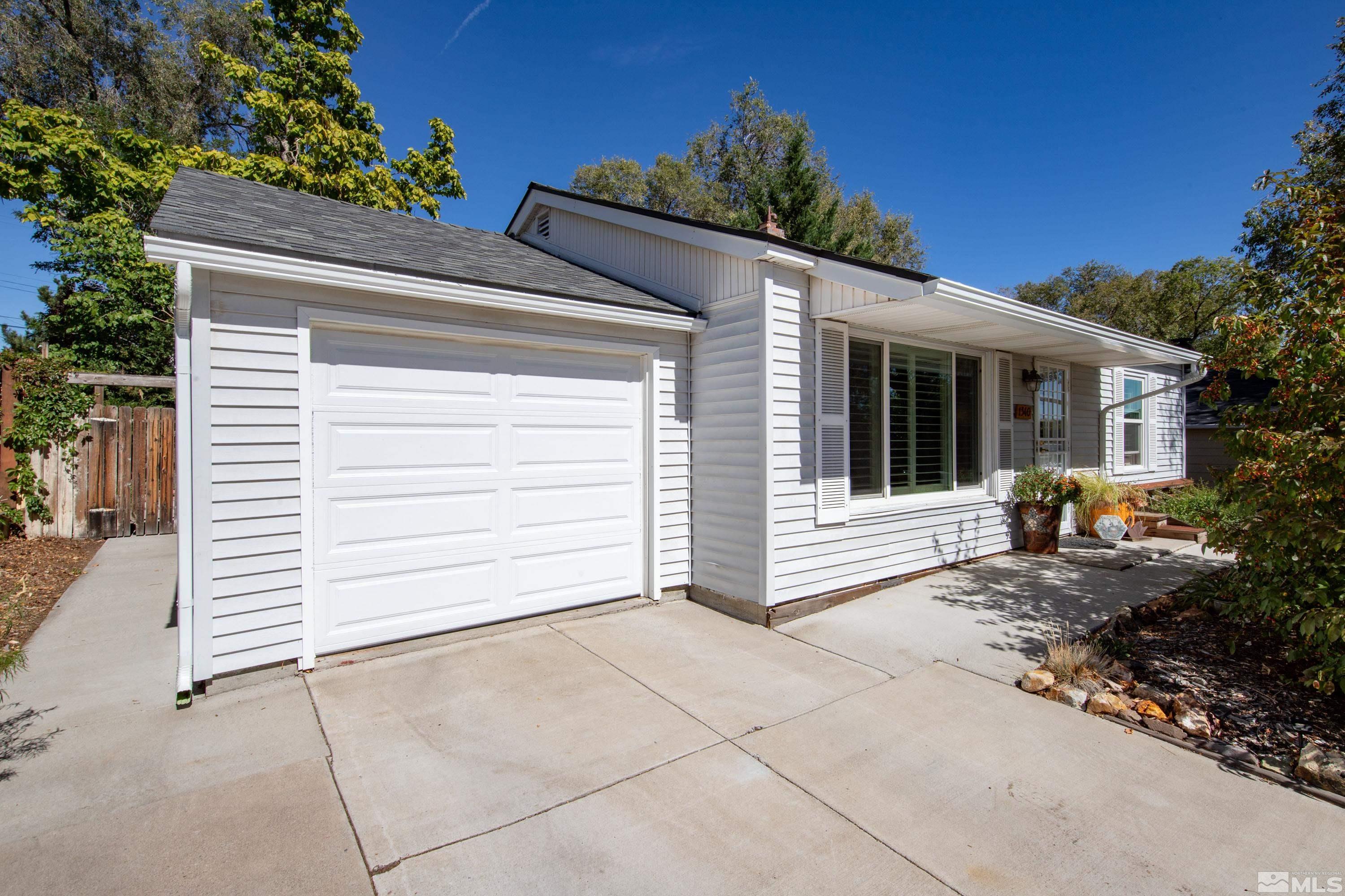 1340 Wesley Drive Reno, NV 89503 - Photo 2 of 39 a view of a house with a yard
