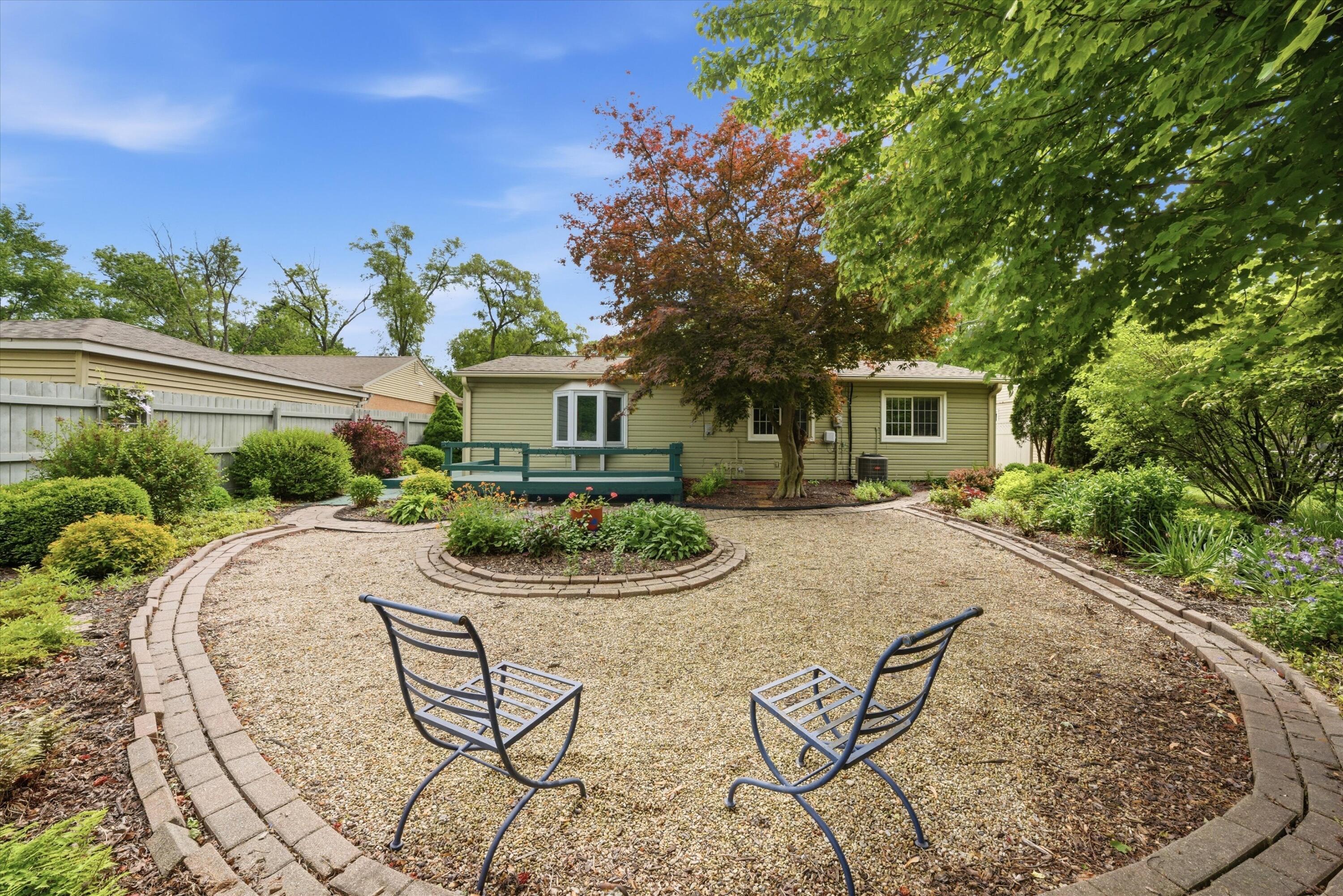 1034 North Indiana Street Griffith, IN 46319 - Photo 14 of 17 a view of a house with backyard and sitting area