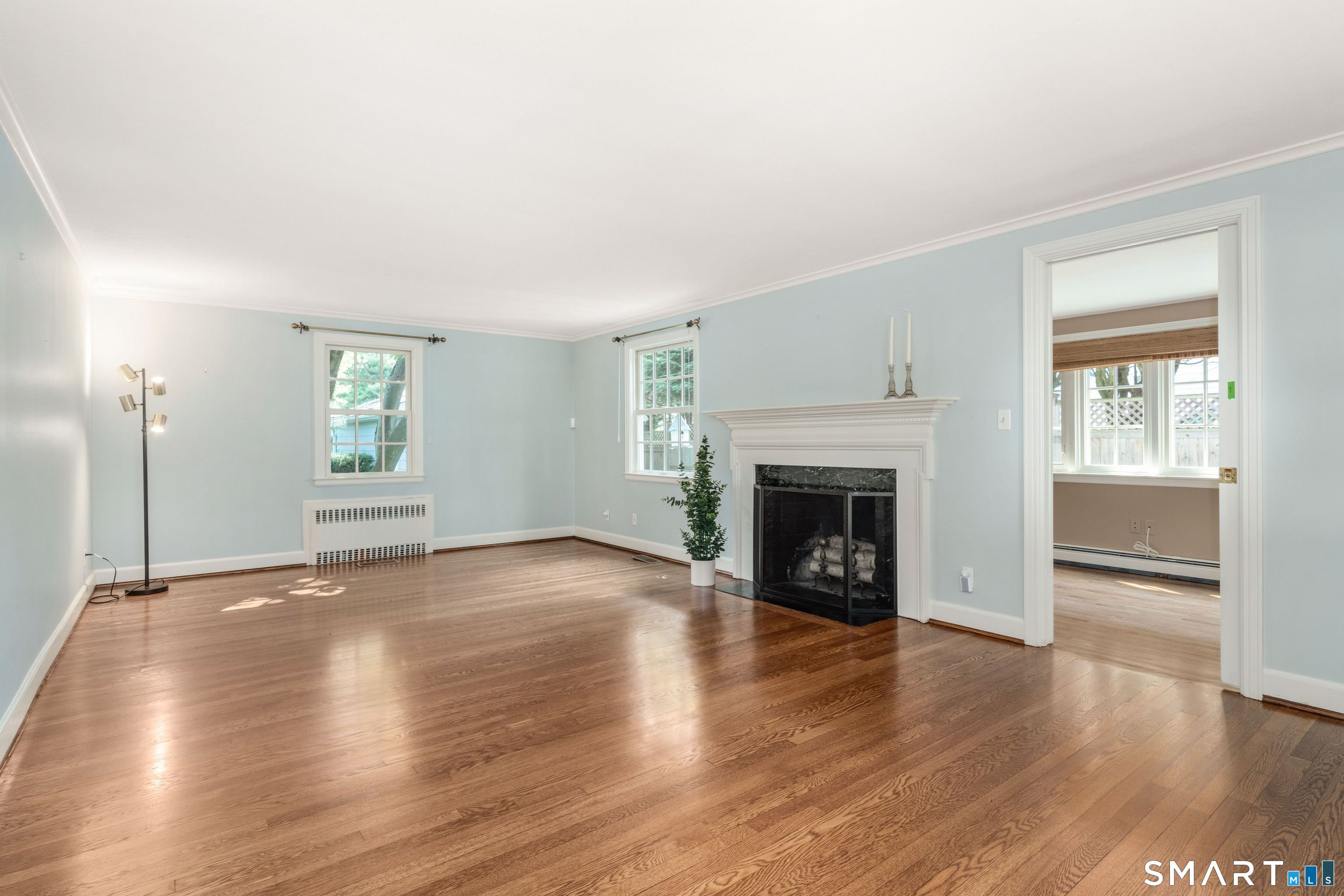 20 Cornell Road West Hartford, CT 06107 - Photo 3 of 40 Freshly redone hardwood floors in the living room, dining room and both offices.