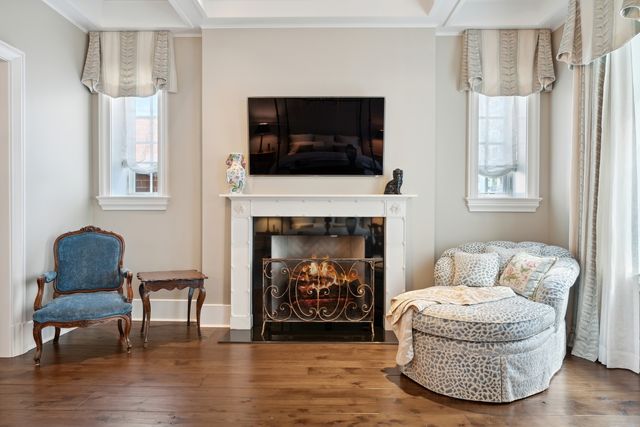 a living room with furniture and a table