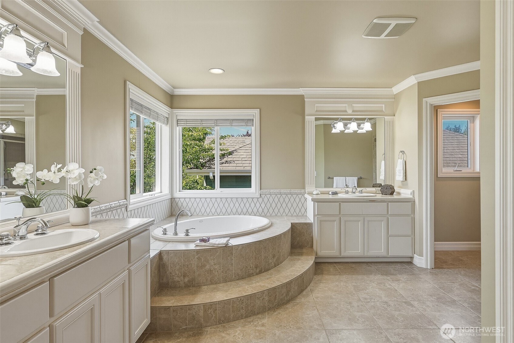 3932 221st Place Southeast Bothell, WA 98021 - Photo 23 of 36 a spacious bathroom with a tub sink and mirror