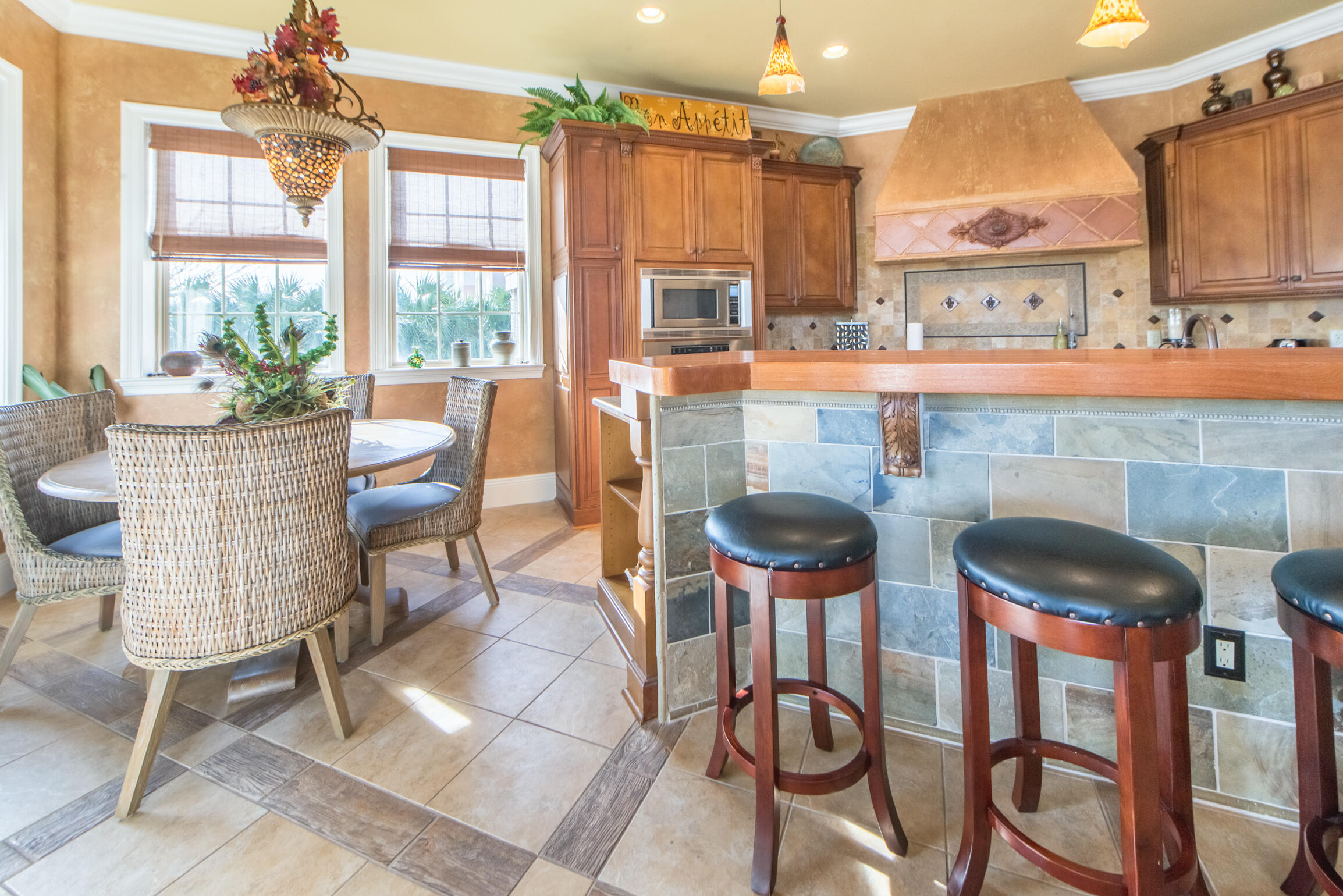 59 St Tropez Court Miramar Beach, FL 32550 - Photo 12 of 37 a kitchen with a table and chairs