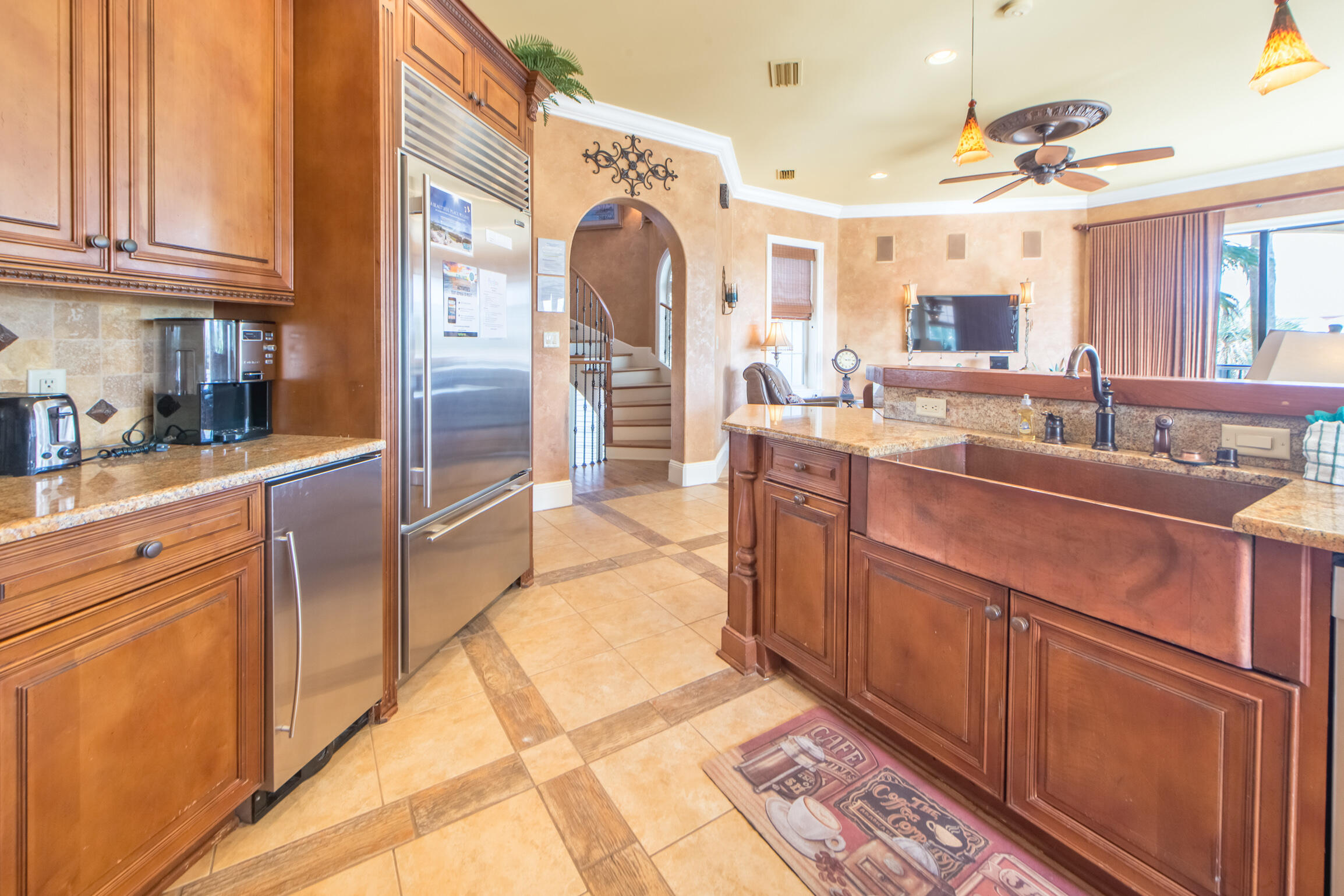 59 St Tropez Court Miramar Beach, FL 32550 - Photo 13 of 37 a large kitchen with stainless steel appliances granite countertop a sink and cabinets