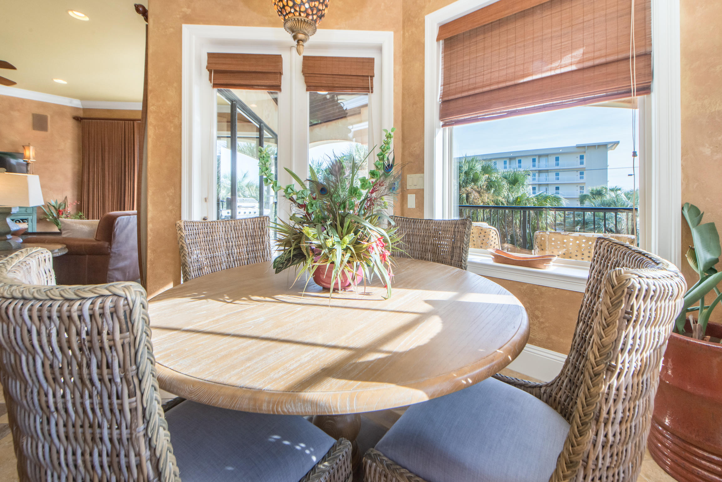 59 St Tropez Court Miramar Beach, FL 32550 - Photo 14 of 37 a dining room with furniture and wooden floor