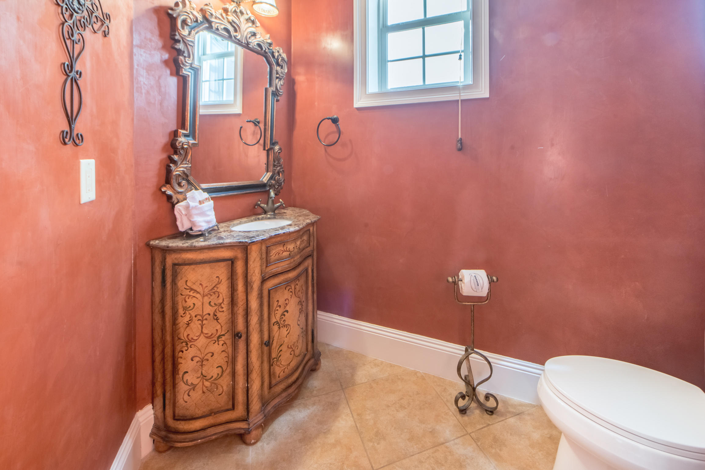 59 St Tropez Court Miramar Beach, FL 32550 - Photo 15 of 37 a bathroom with a granite countertop toilet and a sink