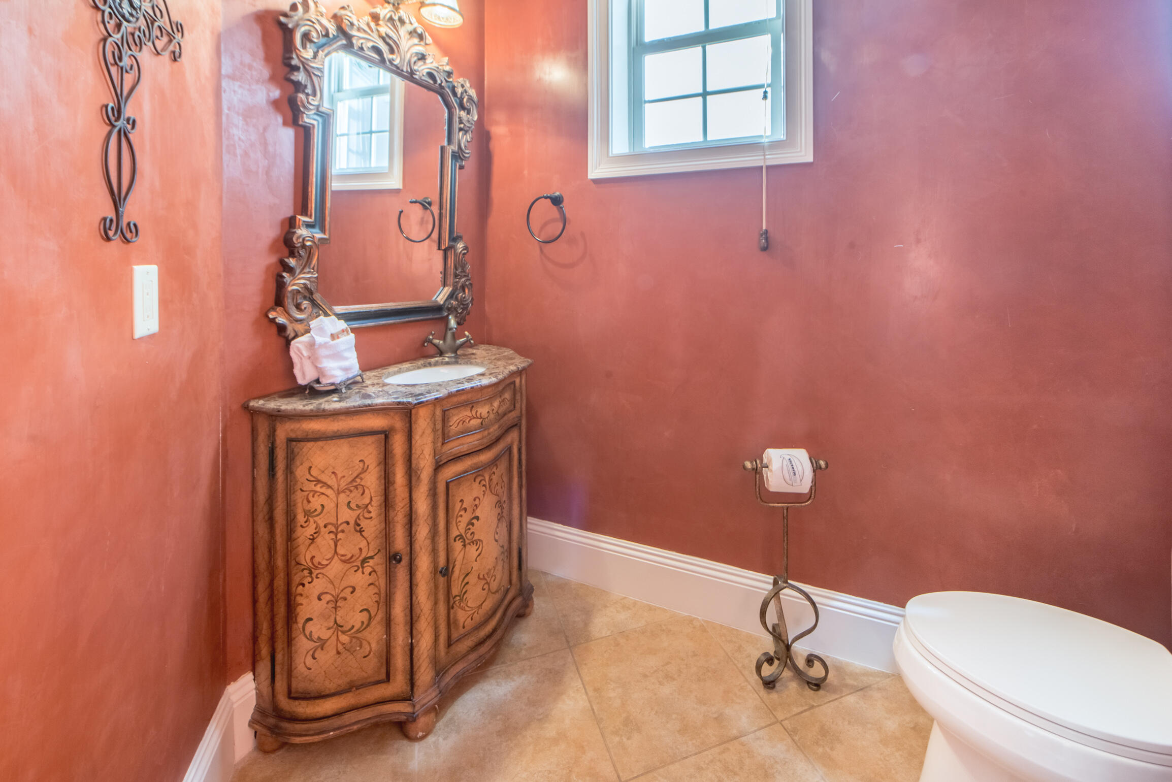 59 St Tropez Court Miramar Beach, FL 32550 - Photo 16 of 37 a bathroom with a granite countertop toilet and a sink