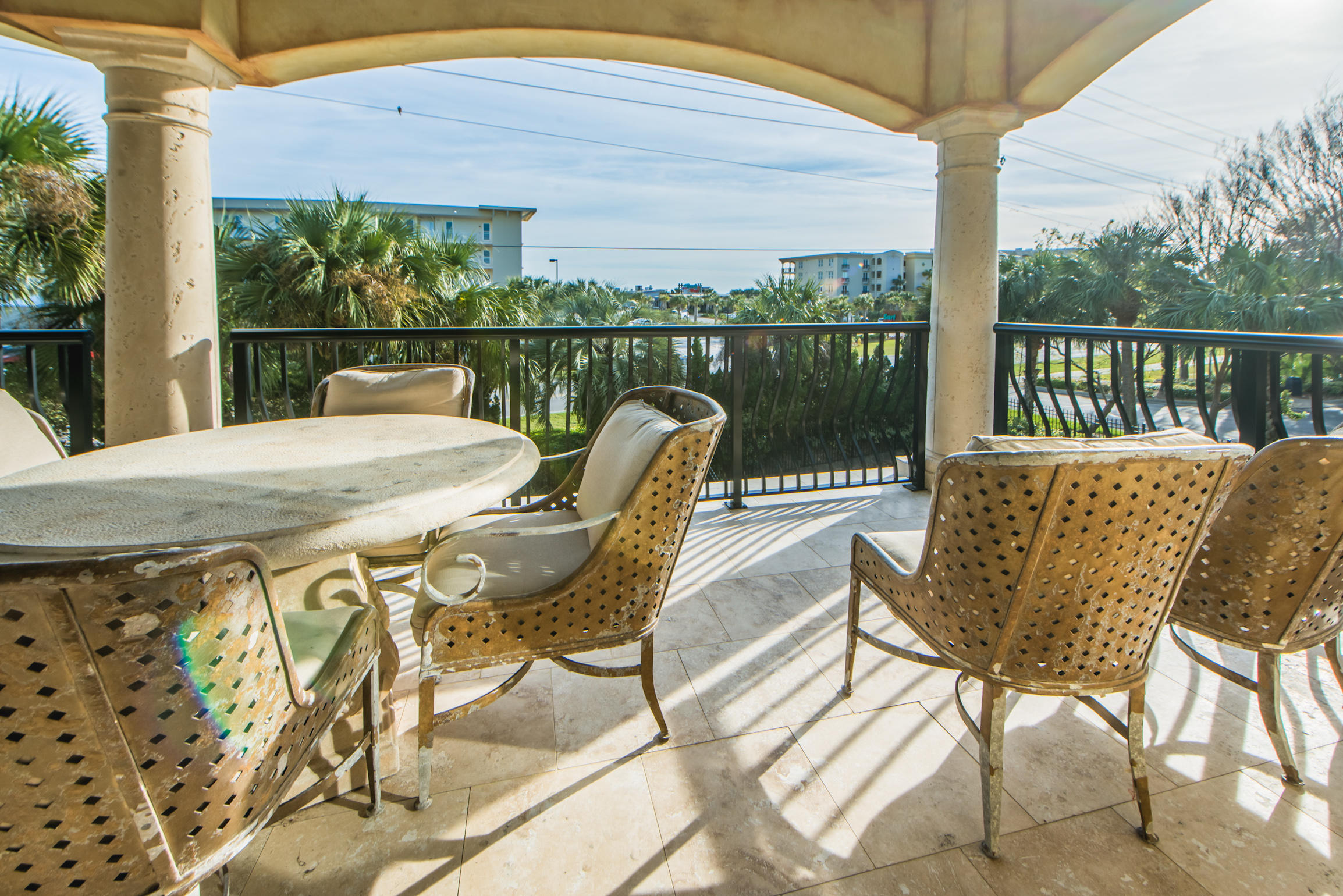59 St Tropez Court Miramar Beach, FL 32550 - Photo 17 of 37 a view of a chairs and table in the balcony