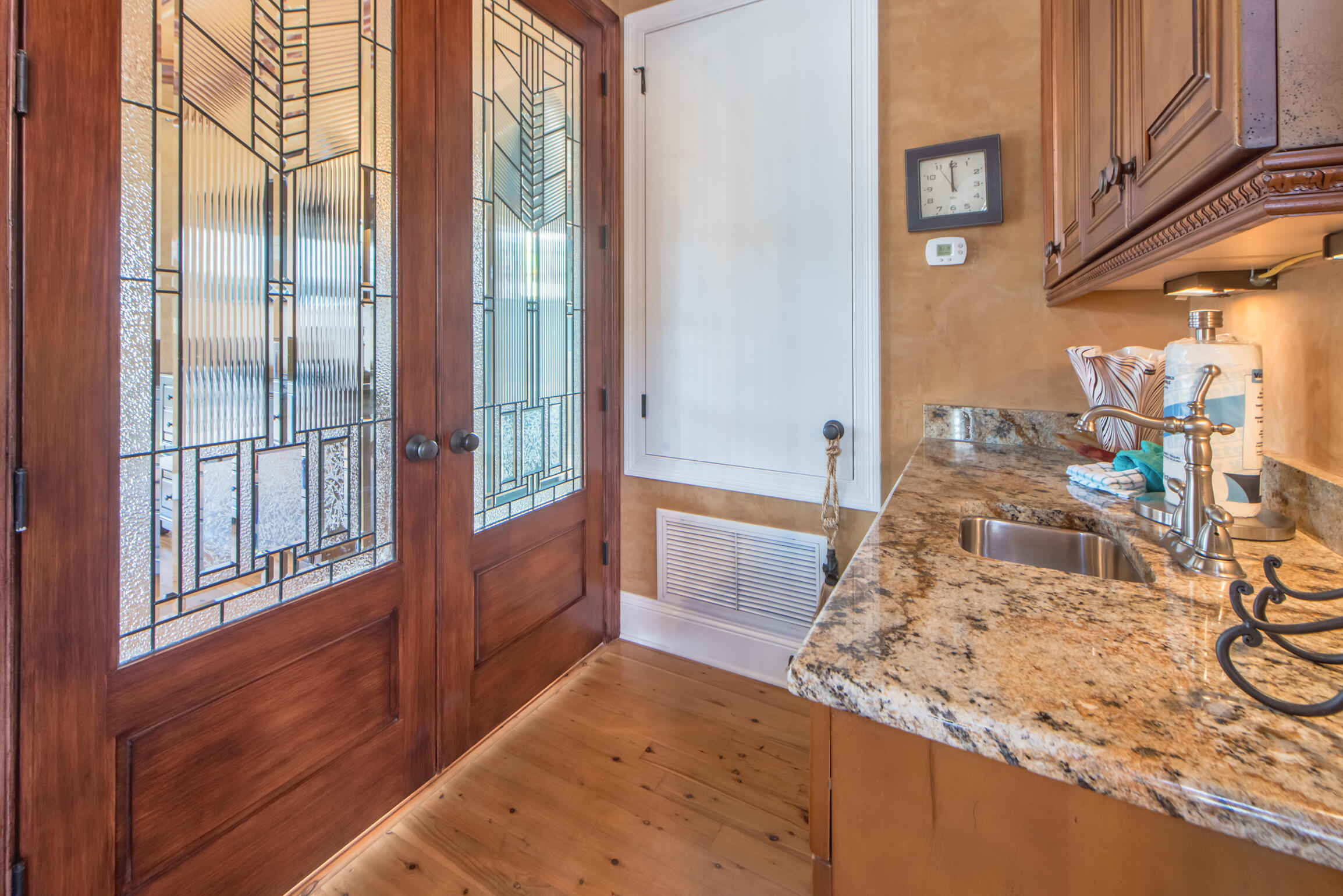 59 St Tropez Court Miramar Beach, FL 32550 - Photo 22 of 37 a view of a bedroom with wooden floor and a large window