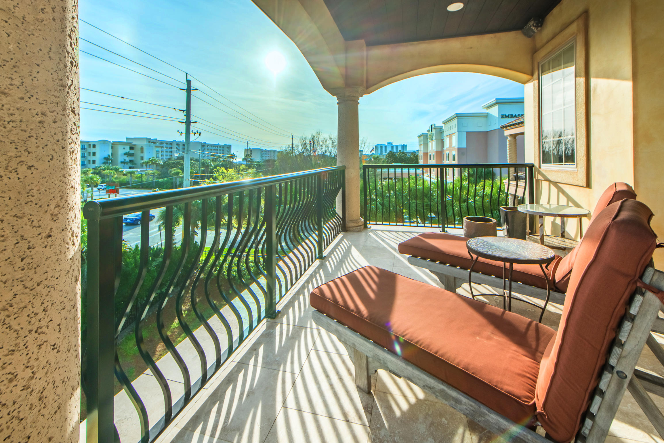 59 St Tropez Court Miramar Beach, FL 32550 - Photo 23 of 37 a view of a chair and tables in the balcony