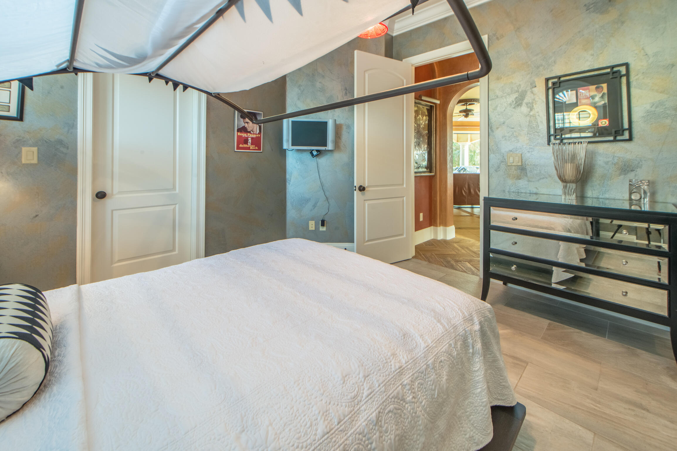 59 St Tropez Court Miramar Beach, FL 32550 - Photo 27 of 37 a bedroom with a bed and a mirror