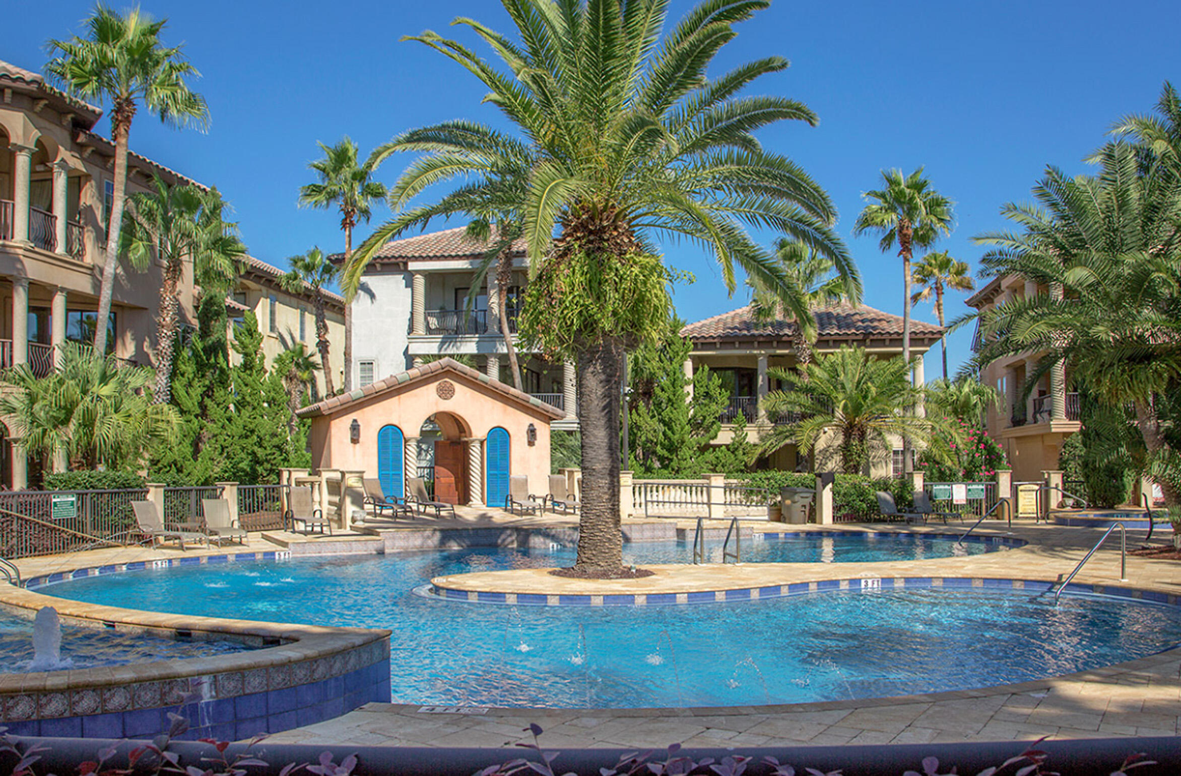 59 St Tropez Court Miramar Beach, FL 32550 - Photo 3 of 37 a front view of a house with swimming pool