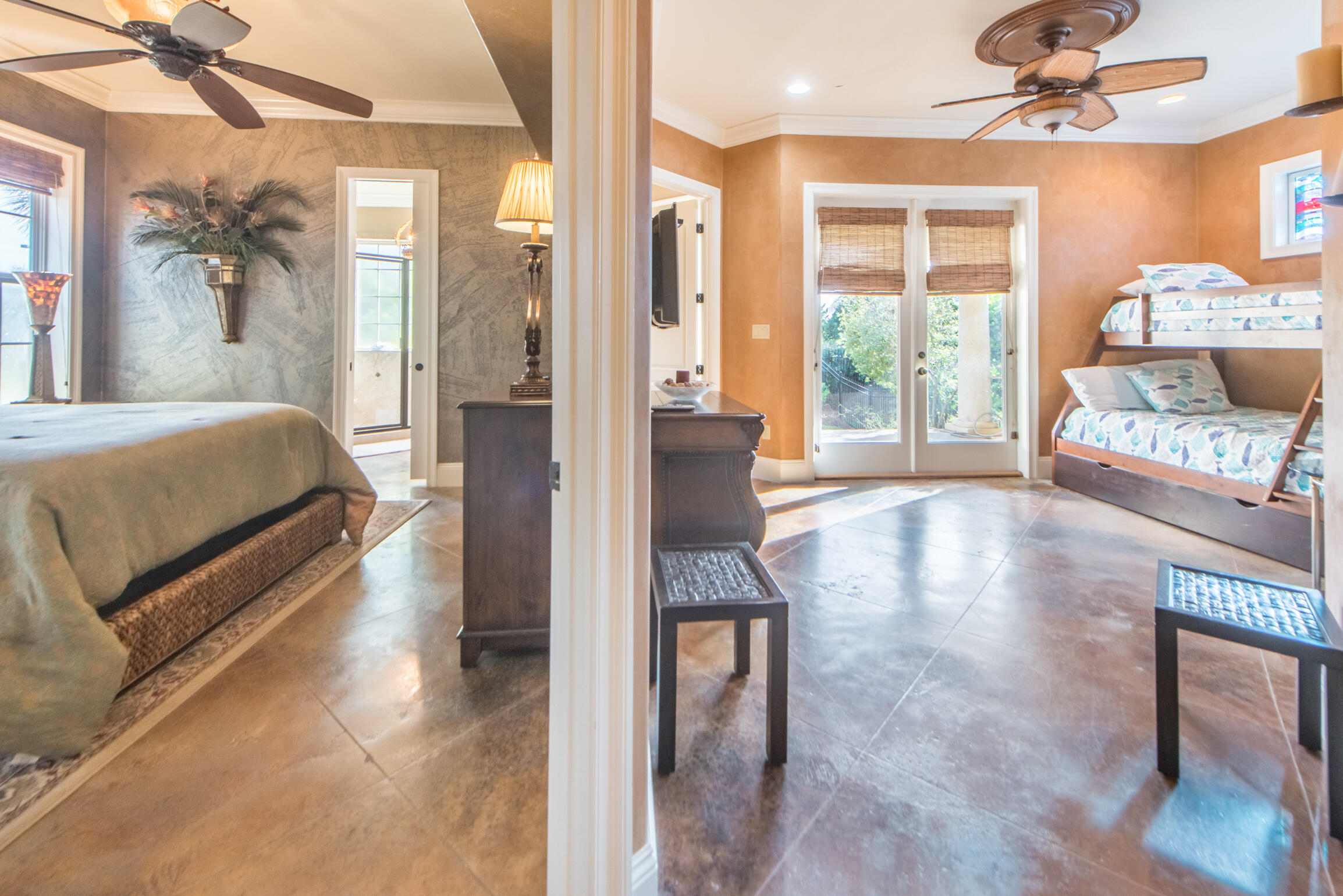 59 St Tropez Court Miramar Beach, FL 32550 - Photo 31 of 37 a spacious bedroom with a bed and a couch