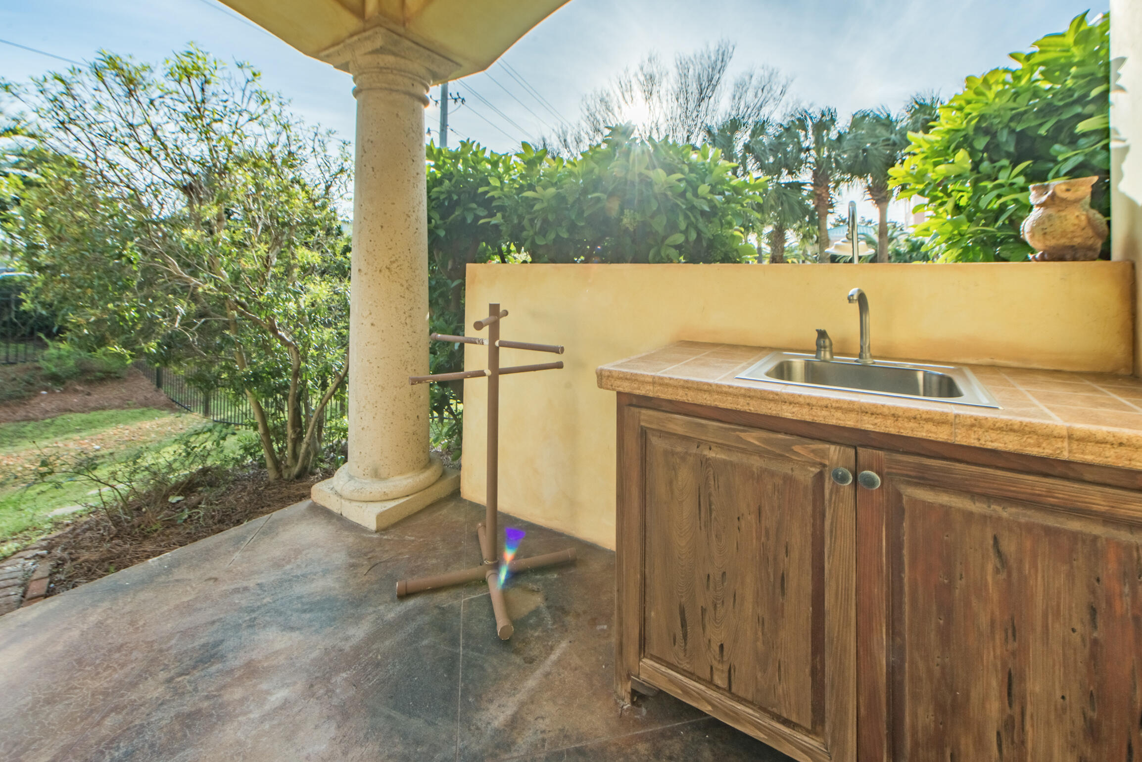 59 St Tropez Court Miramar Beach, FL 32550 - Photo 35 of 37 a view of a wooden house with a sink and yard