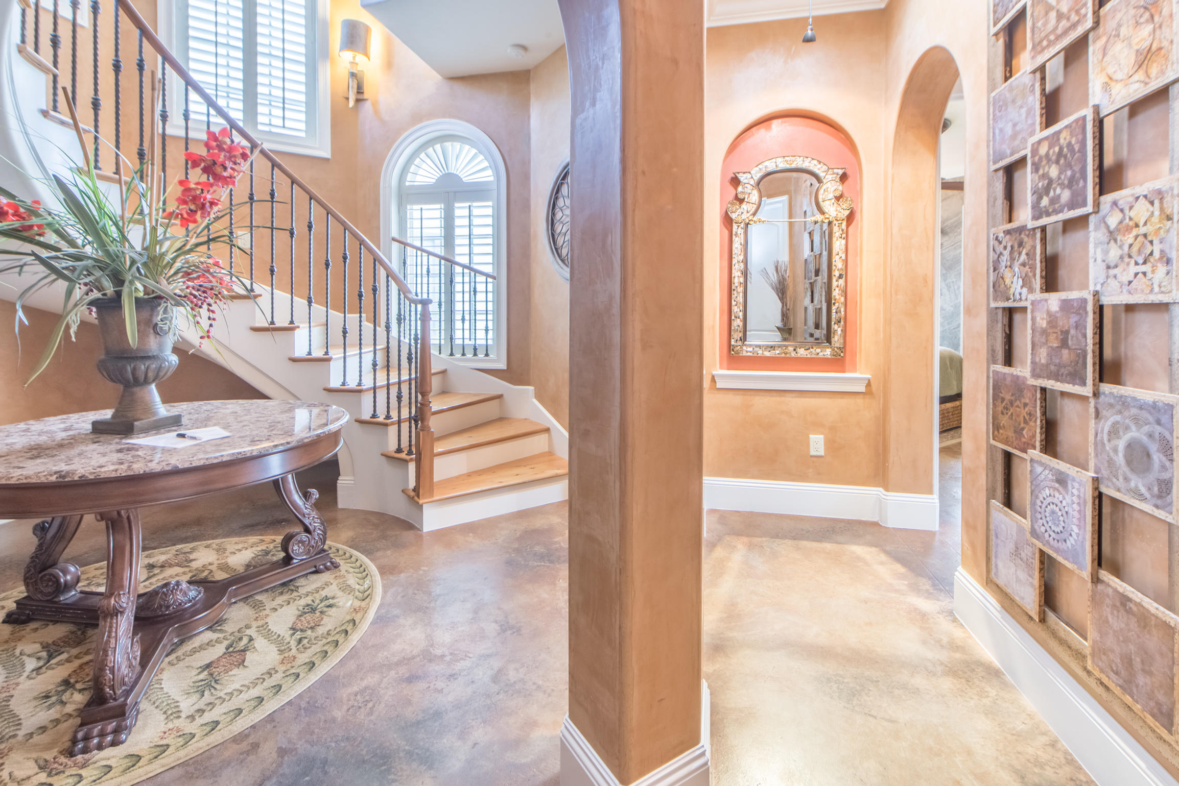 59 St Tropez Court Miramar Beach, FL 32550 - Photo 5 of 37 a view of staircase with open kitchen