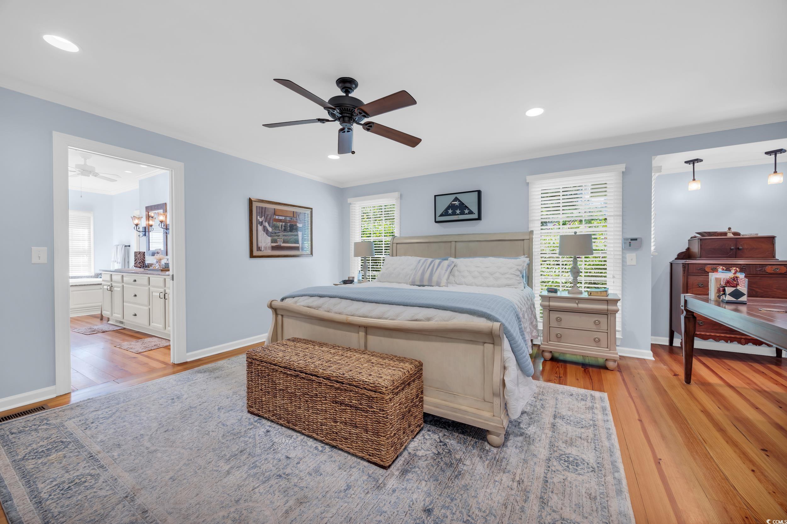 855 Riven Oak Drive Murrells Inlet, SC 29576 - Photo 19 of 37 Bedroom featuring light wood-style floors, ceiling fan, recessed lighting, ensuite bath, and ornamental molding
