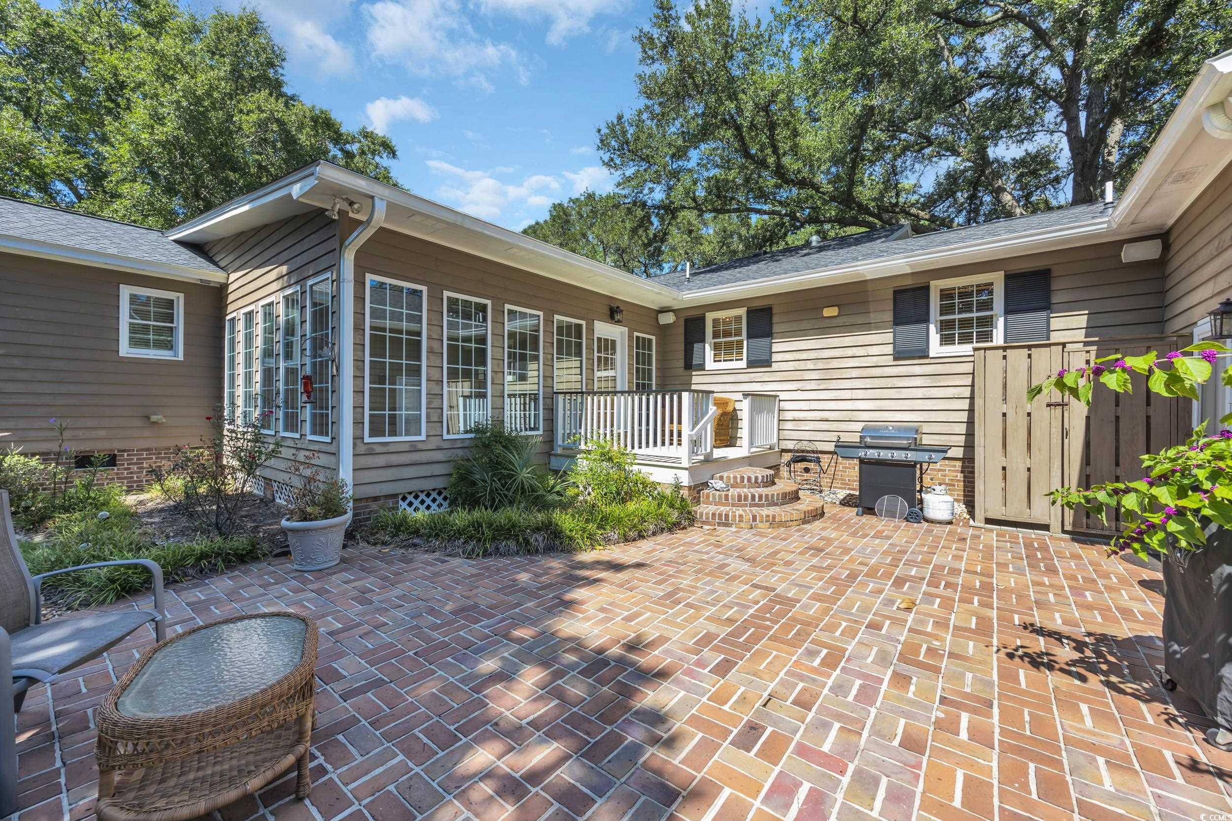 855 Riven Oak Drive Murrells Inlet, SC 29576 - Photo 31 of 37 View of patio with a grill