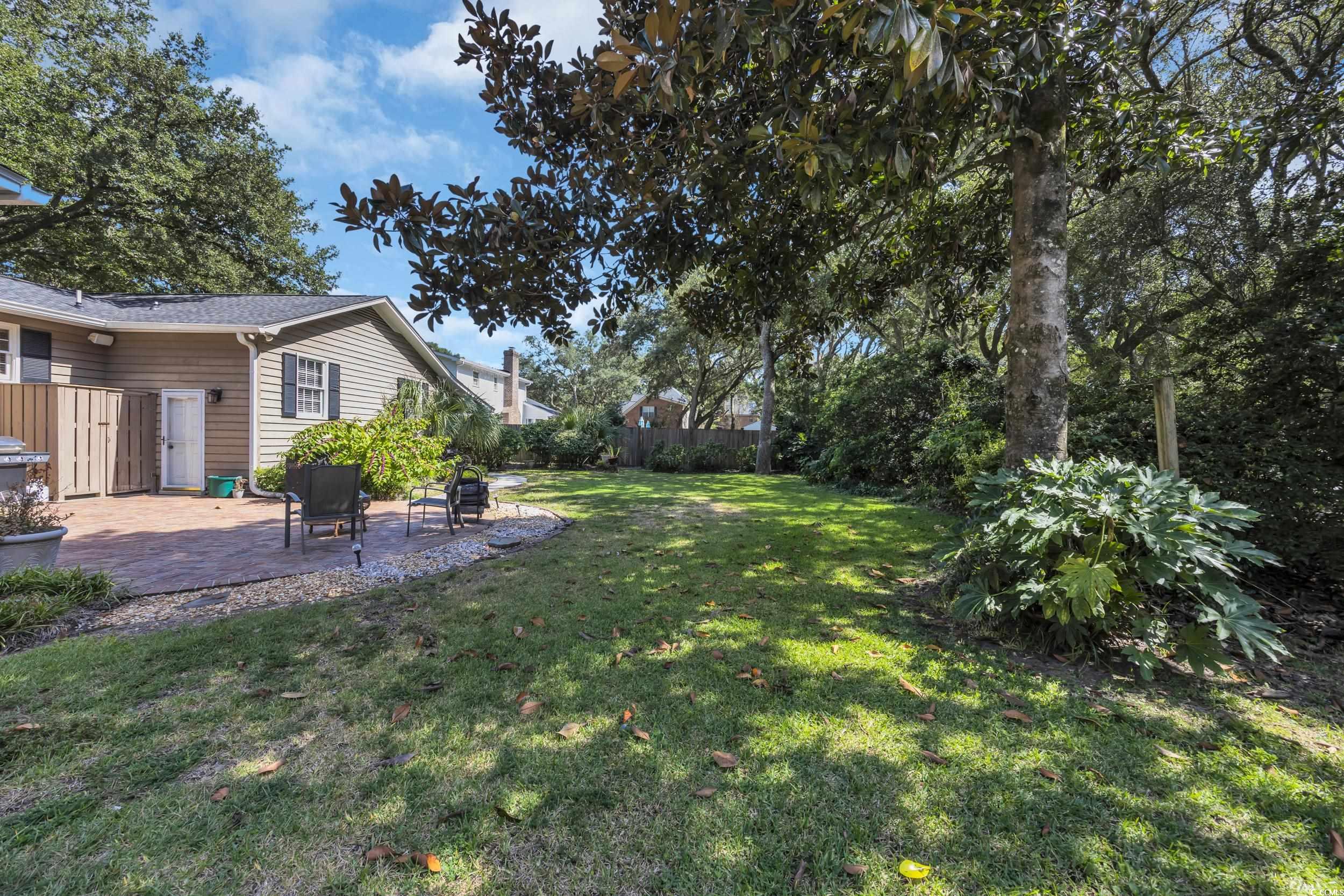 855 Riven Oak Drive Murrells Inlet, SC 29576 - Photo 35 of 37 View of yard featuring a patio