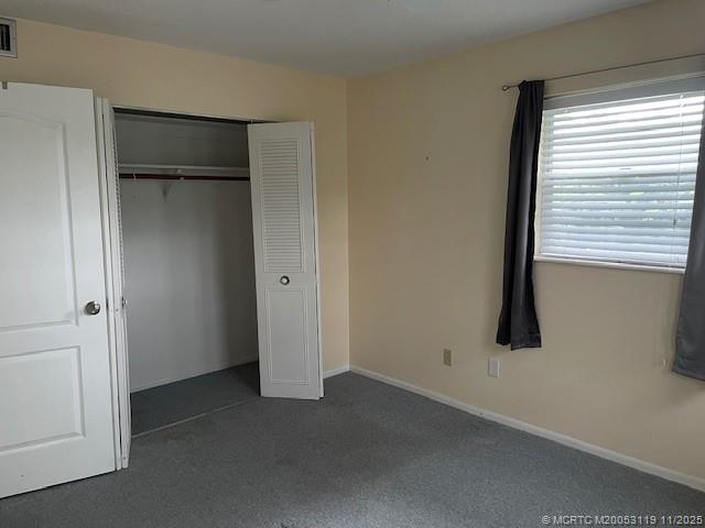 2929 Southeast Ocean Boulevard, Unit 10810 Stuart, FL 34996 - Photo 15 of 24 a view of an empty room with a window