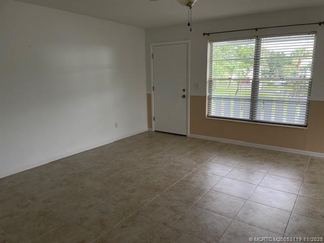 2929 Southeast Ocean Boulevard, Unit 10810 Stuart, FL 34996 - Photo 3 of 24 a view of an empty room with a window