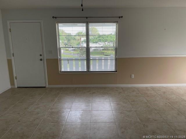 2929 Southeast Ocean Boulevard, Unit 10810 Stuart, FL 34996 - Photo 7 of 24 a view of an empty room with a window