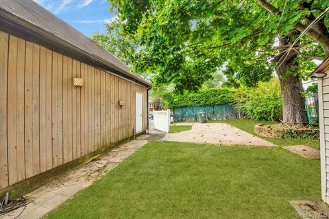 a view of back yard with green space