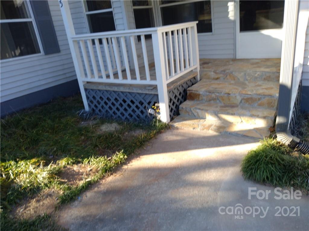 245 Roy Goins Road Rutherfordton, NC 28139 - Photo 2 of 23 a view of a pathway of a house