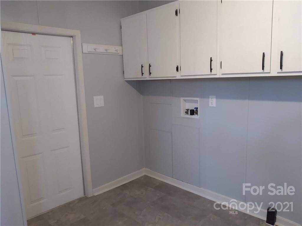 245 Roy Goins Road Rutherfordton, NC 28139 - Photo 15 of 23 a view of cabinets and wooden floor