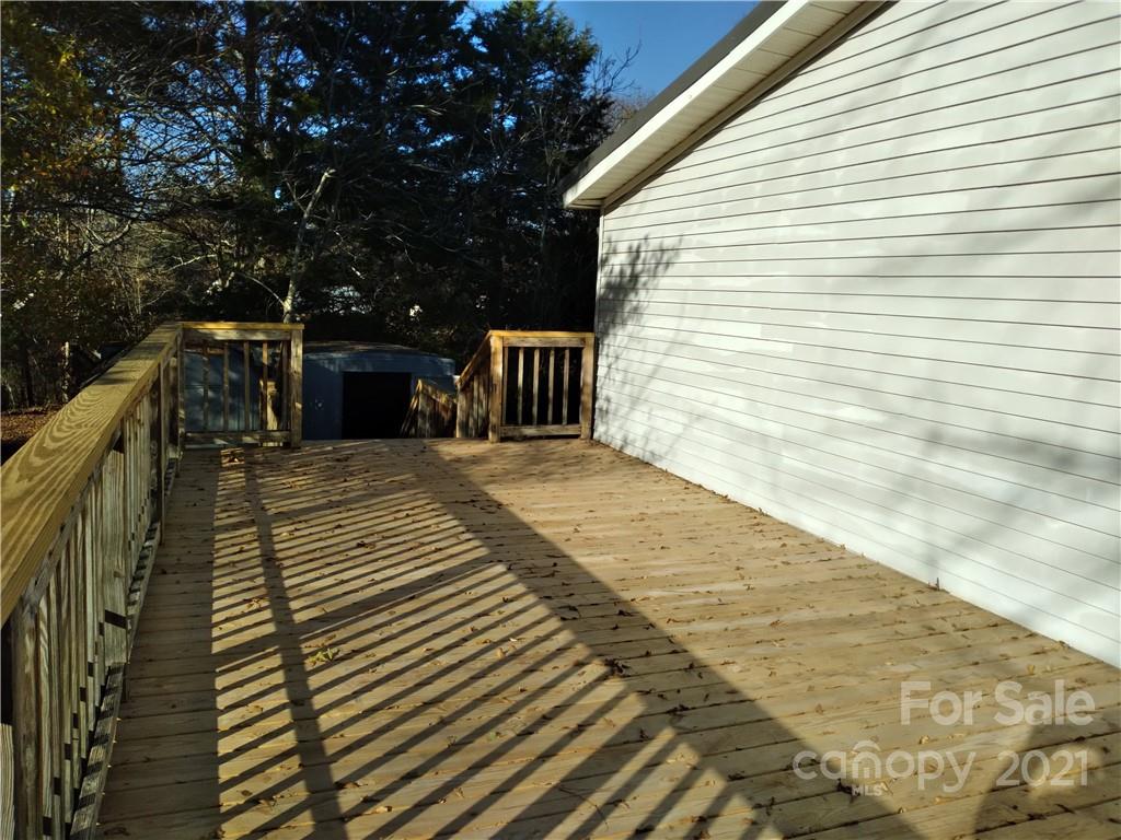 245 Roy Goins Road Rutherfordton, NC 28139 - Photo 19 of 23 a view of a balcony with chairs