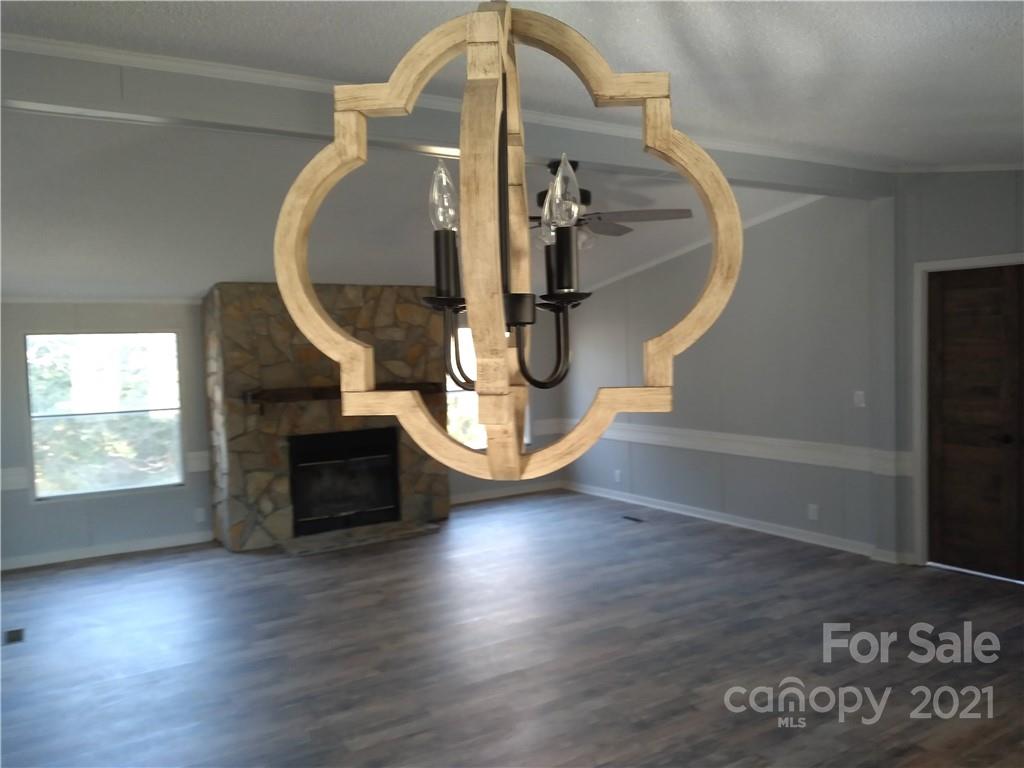 245 Roy Goins Road Rutherfordton, NC 28139 - Photo 3 of 23 a view of entryway and hall with wooden floor