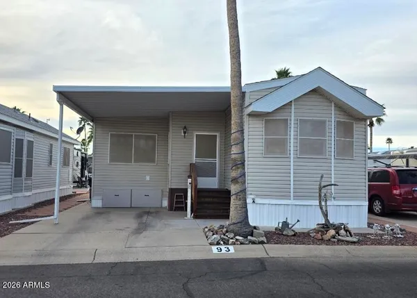 a front view of a house with garage
