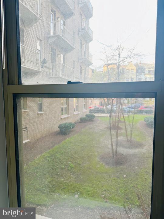 1308 Clifton Street Northwest, Unit 105 Washington, DC 20009 - Photo 12 of 21 a view of a glass door with a yard