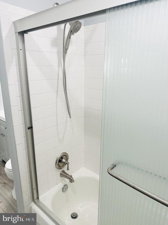 1308 Clifton Street Northwest, Unit 105 Washington, DC 20009 - Photo 20 of 21 a bathroom with a shower and a sink