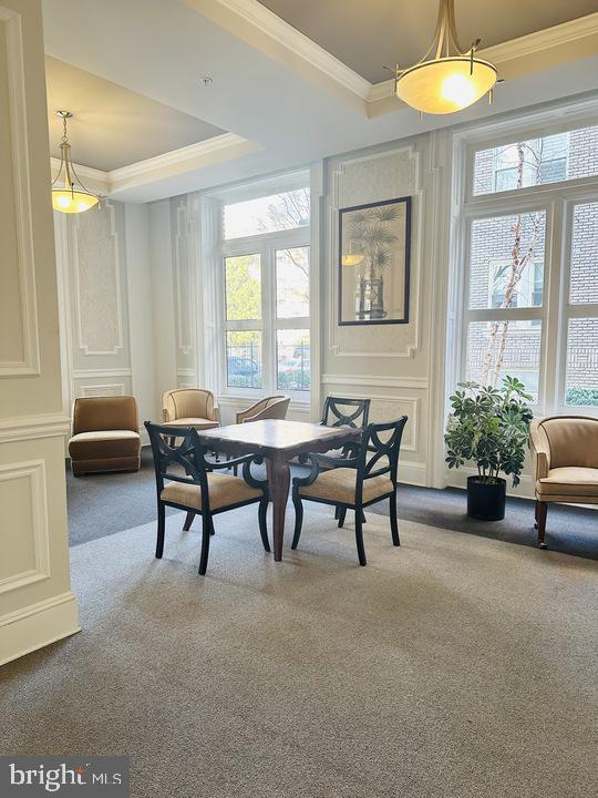 1308 Clifton Street Northwest, Unit 105 Washington, DC 20009 - Photo 2 of 21 a view of a dining room with furniture window and outside view
